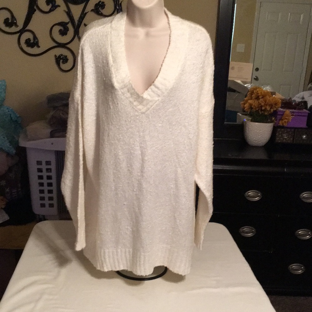 Woman v neck size XXL/ 20 cream colored .